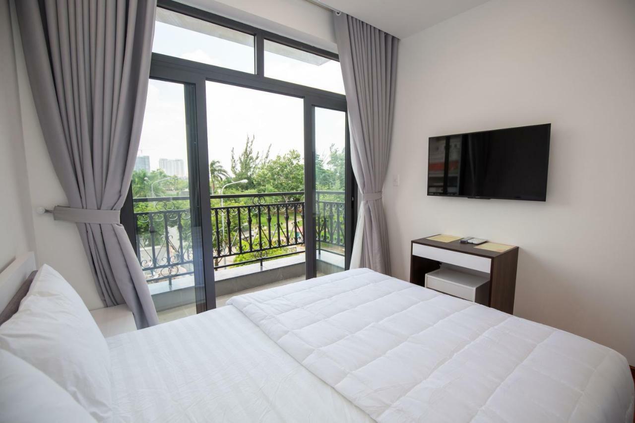 Melie Riverview Apartment Хошимин Экстерьер фото