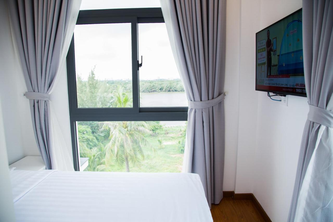 Melie Riverview Apartment Хошимин Экстерьер фото
